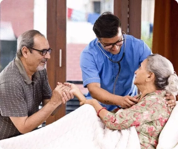 Image of a couple receiving home care services in Noida